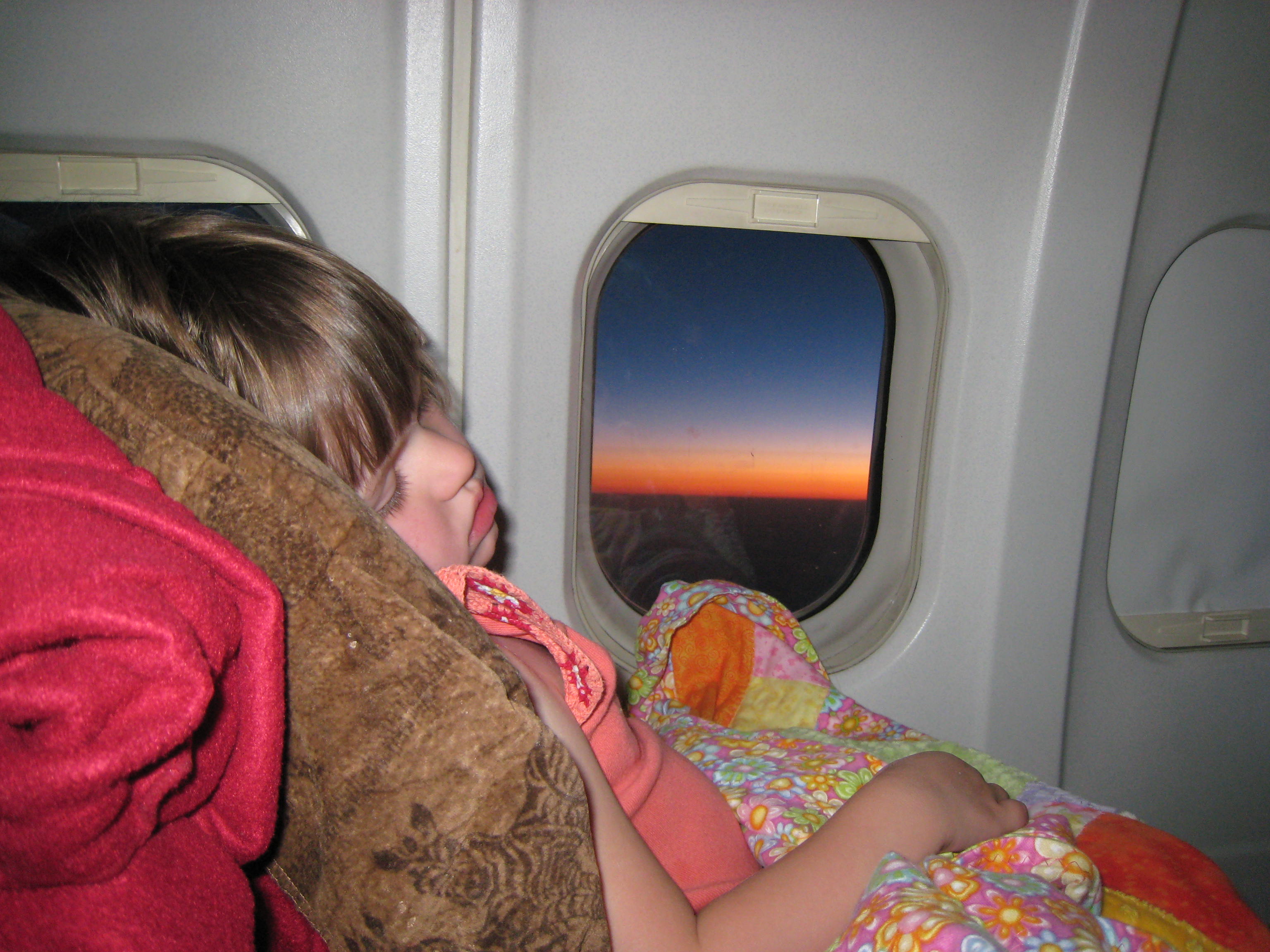 asleeponplane.jpg